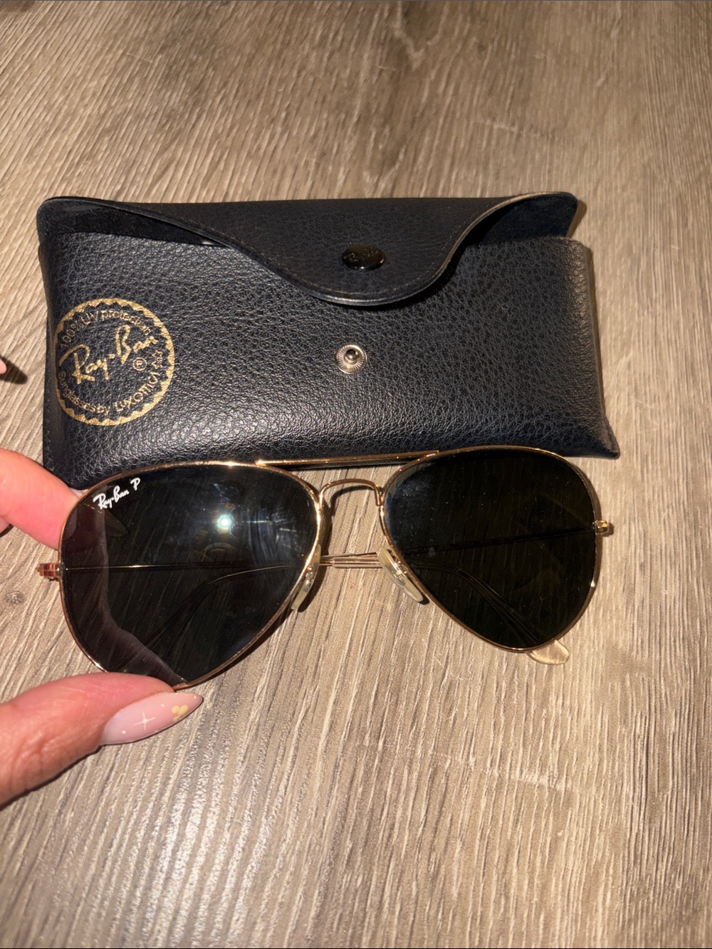 Ray-Ban Aviator Sunglasses Gold Frame with Black Lenses.